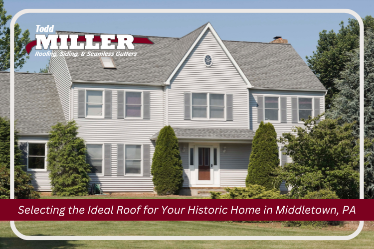 Colonial-style historic home with asphalt shingle roof