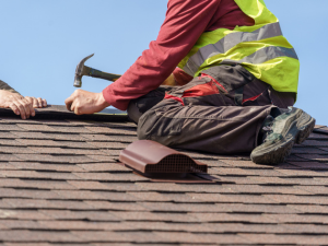 Palmer Heights' finest – Todd Miller's roof repair team in action on a Palmer Heights home.