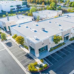 Todd Miller Roofing, Siding, and Seamless Gutters Commercial Roofing - click to view Durolast commercial roofing catalog with flat roofing and warranties included